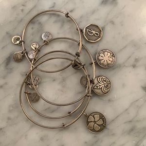 Set of four alex and ani bracelets.